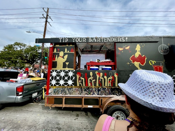 Mardi Gras float painted to look like a tavern bar at Our First Mardi Gras Parade