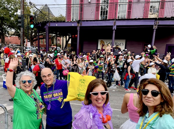 Our First Mardi Gras Parade with lots of revelers on the route along with me, Steve and two of our friends.
