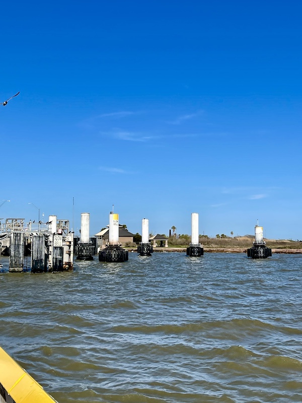 Padded floating pylons in view as we approach Port Bolivar on our From our Free Galveston Texas Ferry ride 