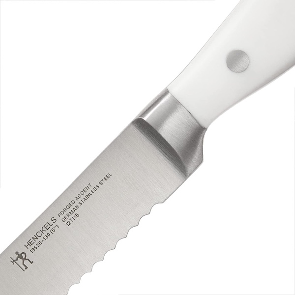 My New Henckels Paring and Utility Knives showing the blade of the utility knife with white handle and brand name.