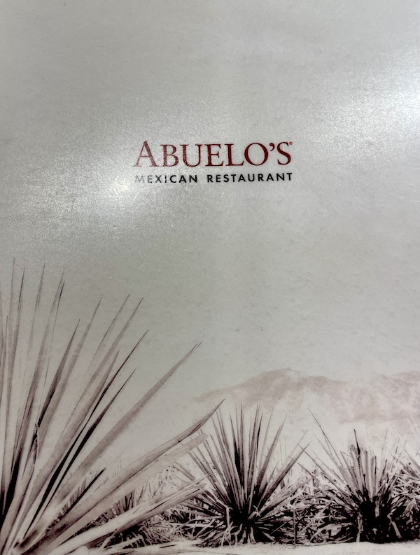 Ivory colored menu cover for Abuelo's Mexican Restaurant Midland TX
