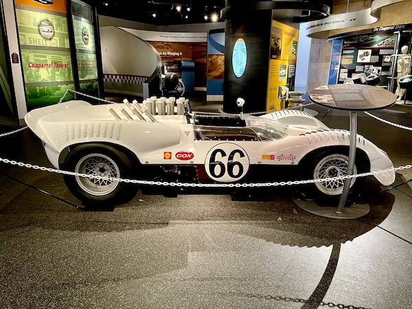 White and black race car with pipes sticking up behind the cockpit at the Chaparral Gallery Petroleum Museum