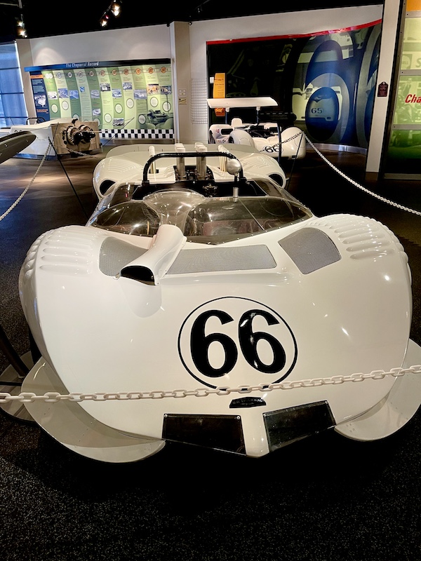 Front view of a white and black racing car at the Chaparral Gallery Petroleum Museum