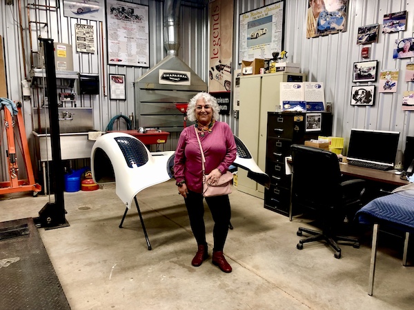 Me in front of the front section of a race car at the Chaparral Gallery Petroleum Museum