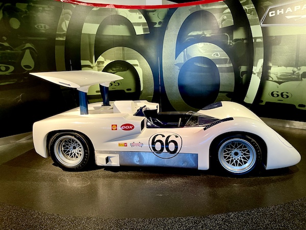 White racing car with rear wing on display at the Chaparral Gallery Petroleum Museum