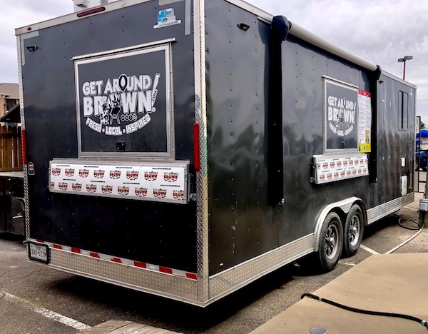Black cargo trailer for event catering at Get Around Brown BBQ Midland TX