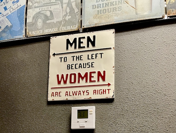 Funny sign directing you to the restrooms at Get Around Brown BBQ Midland TX