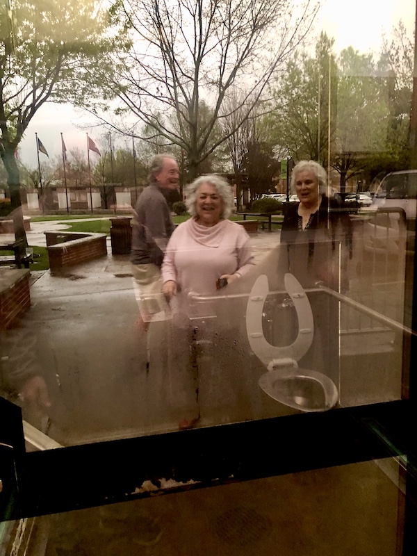Looking out of one of the Glass Bathrooms of Sulphur Springs TX Steve took a picture of me and our friends.