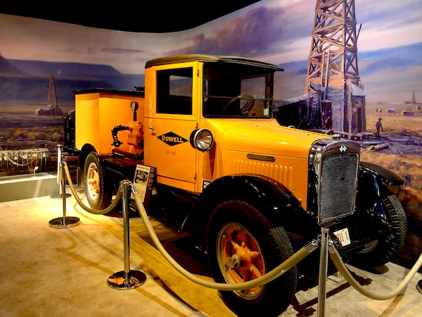 Bright yellow 1932 Model A4 International truck on display at the Petroleum Museum Midland Texas