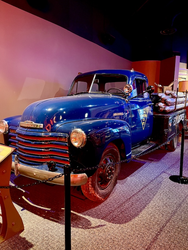 Old blue Chevy pick up truck loaded with explosives on display at the Petroleum Museum Midland Texas