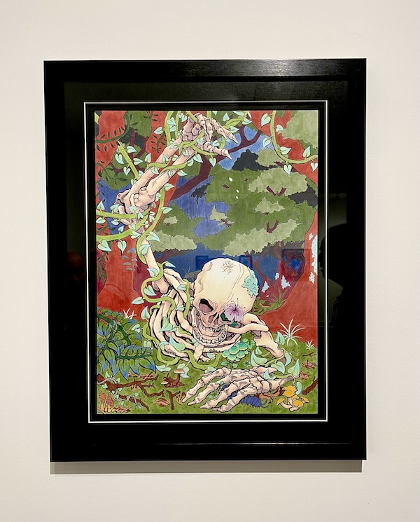 Art depicting a skeleton with flowers and vines at The Grace Museum Abilene TX