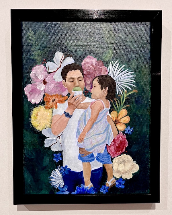 Painting of a father sharing green ice cream with his toddler daughter on display at The Grace Museum Abilene TX