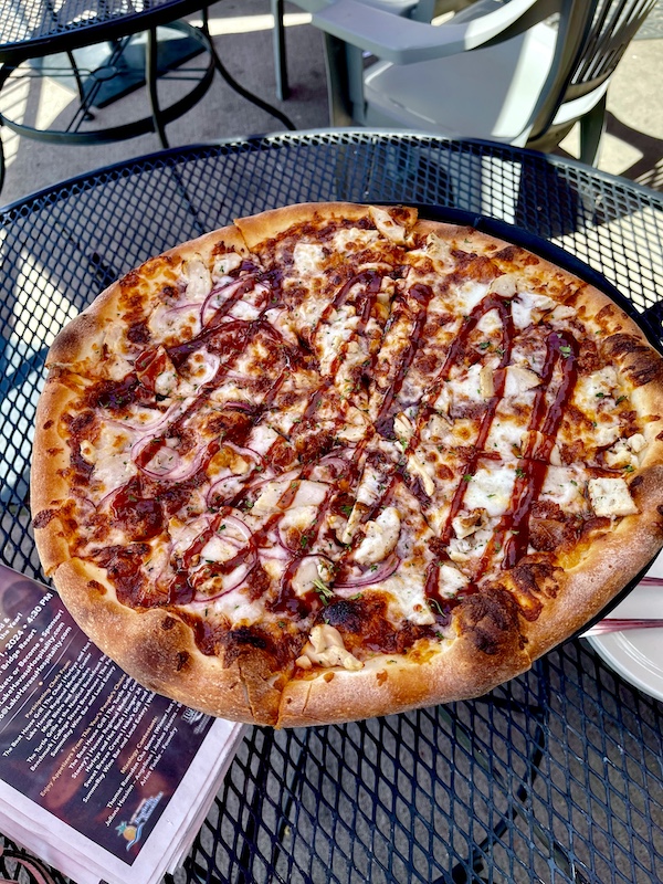 Whole pizza with chicken bacon and bbq sauce drizzle for lunch on our Beautiful Lake Havasu Arizona