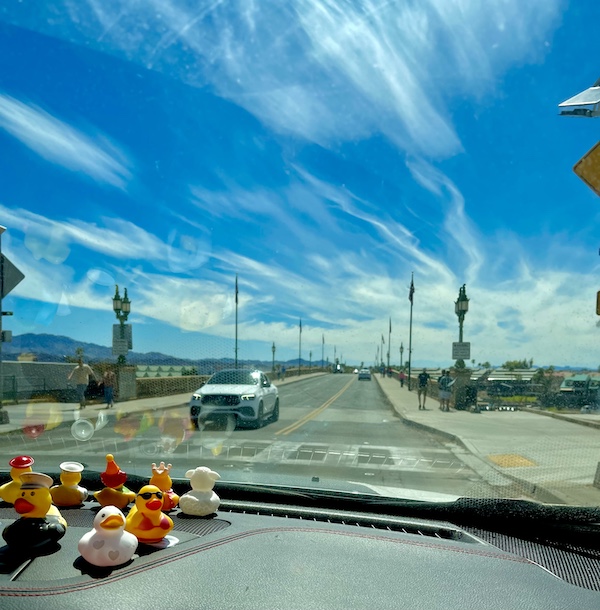 Our jeep with lots of ducks on dash seen while driving across London Bridge Lake Havasu AZ