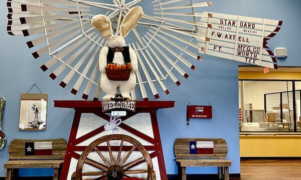 Windmill with a big stuffed bunny at Susie's South Forty Midland TX
