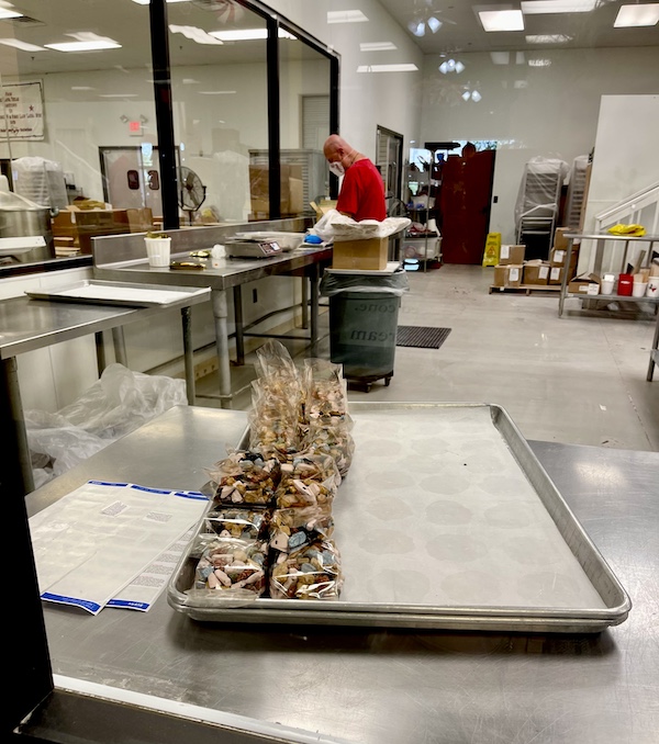 Clear bags of dark chocolate balls with chopped nuts at Susie's South Forty Midland TX
