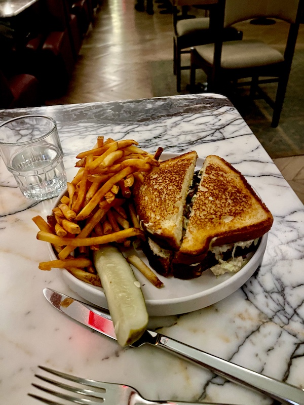 The tuna sandwich with fries and a pickles spear at Moonlark's Dinette The Hoxton LA