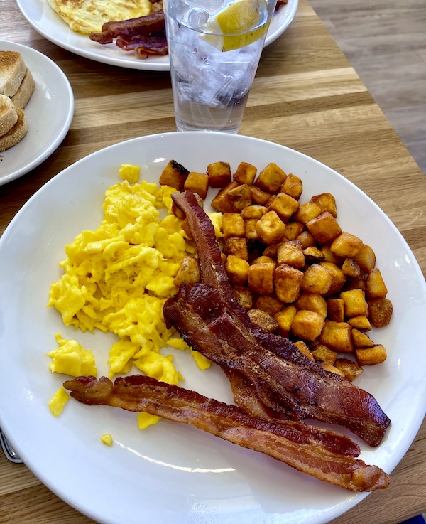 Steve's Brunch at Scrambled Henderson NV was scrambled eggs, bacon, home fries and toast.
