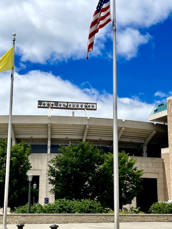 Notre Dame football stadium with flags flying and a Happy July 4th 2024!