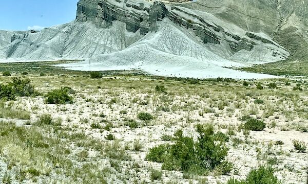 Rock formations that resemble cliffs of sand and stone