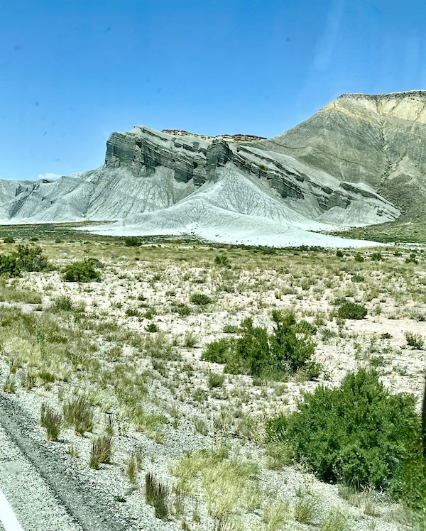 Rock formations that resemble cliffs of sand and stone