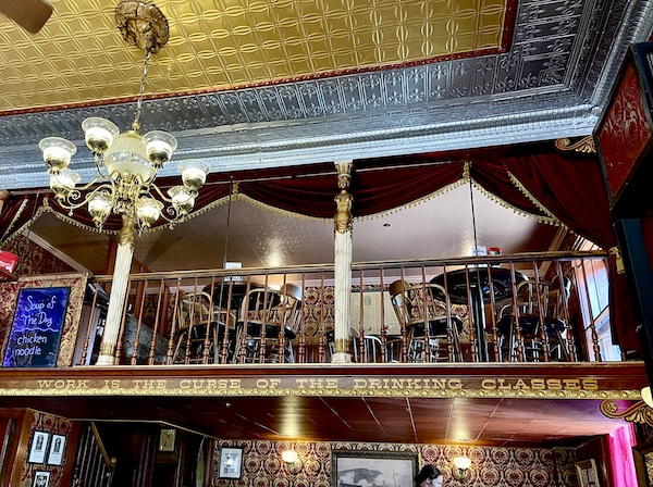Loft dining room with tables and chairs at Diamond Belle Saloon Durango