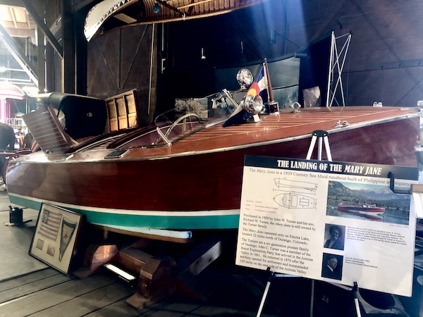 Small wood speedboat on display at the Durango and Silverton Narrow Gauge Railroad Museum
