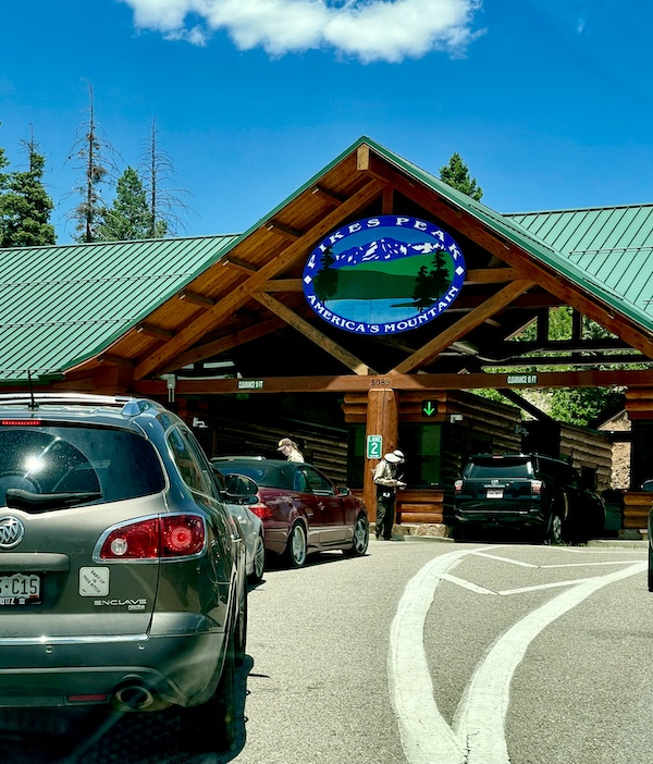 Wood building with green roof is a check point to ascend Pike's Peak