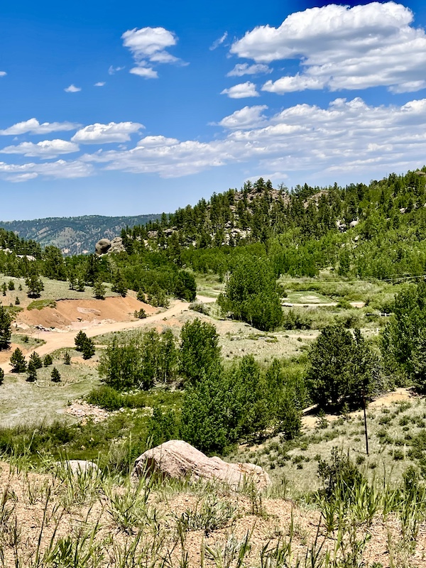 Vista with mountains and forest on ride up Pikes Peak in Colorado