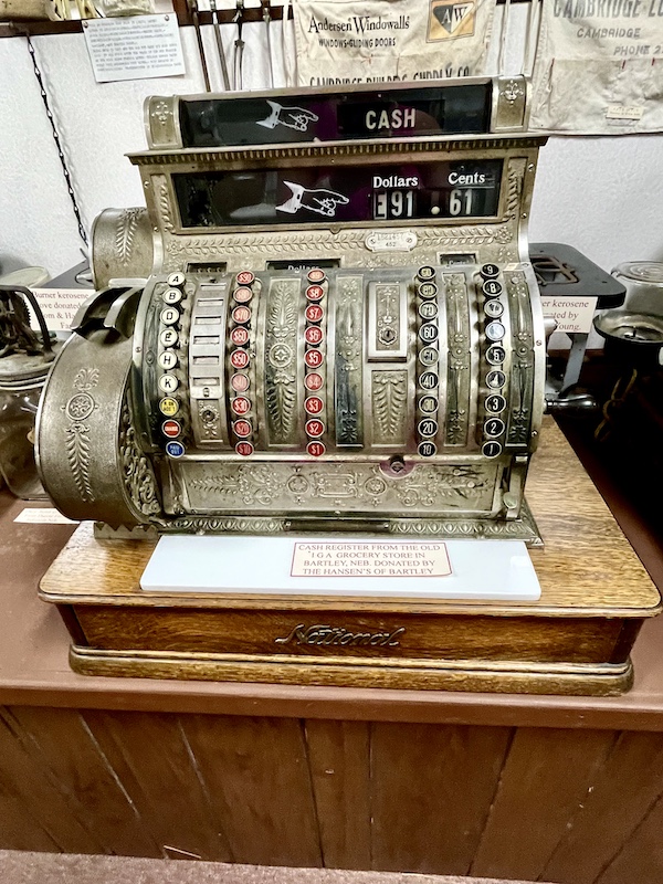 Ornate metal cash register on display at Nebraska's Cambridge Museum