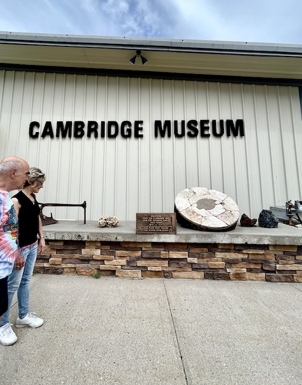 White building with artifacts outside is the Nebraska's Cambridge Museum