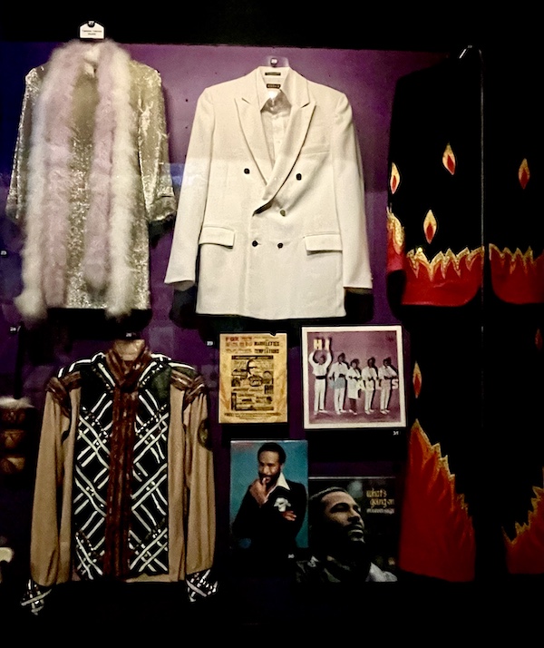 Costumes Marvin Gaye wore including white dinner jacket and colorful shirt.
