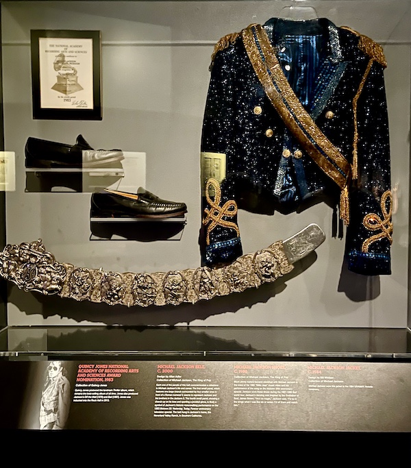 Black sequined jacket, shoes and other Michael Jackson memorabilia at the Rock and Roll Hall of Fame