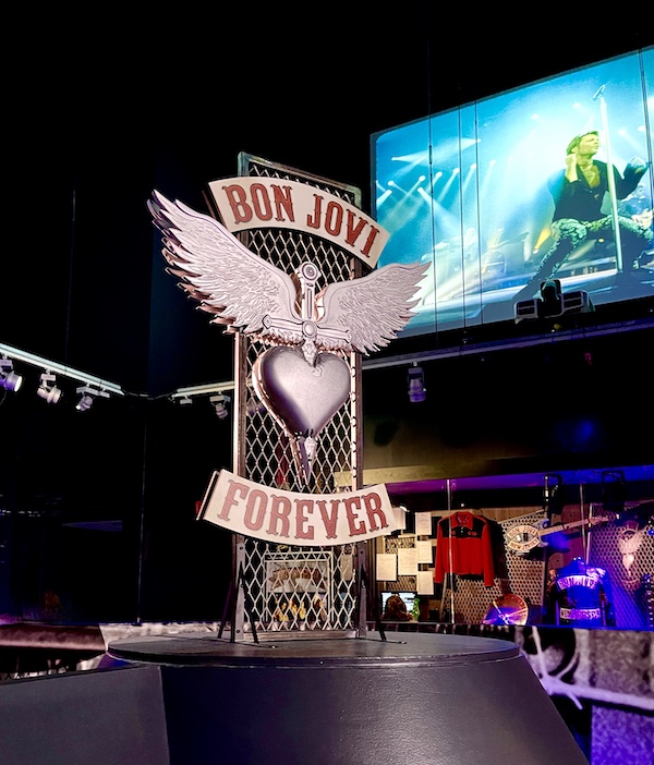Large sculpture of white wings, cross and heart for the Bon Jovi Forever exhibit at the Rock and Roll Hall of Fame