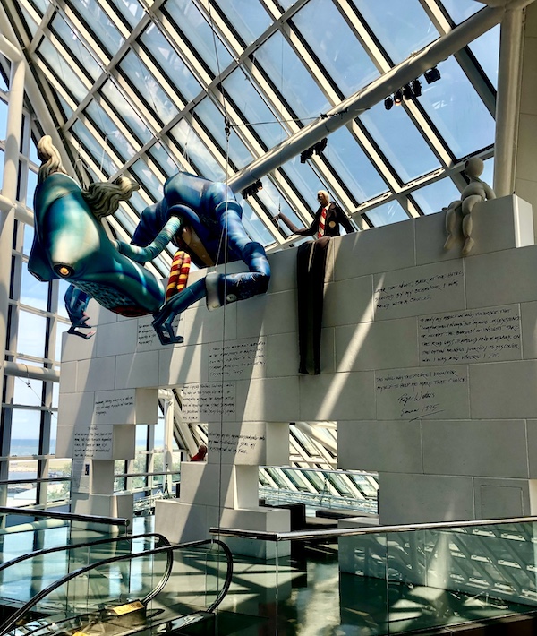 Colorful surreal sculpture hanging below the skylight at the Rock and Roll Hall of Fame