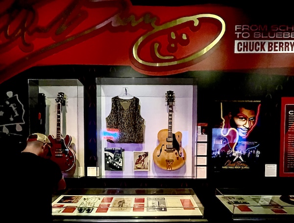 Leopard print vest and guitars of Chuck Berry at Rock and Roll Hall of Fame