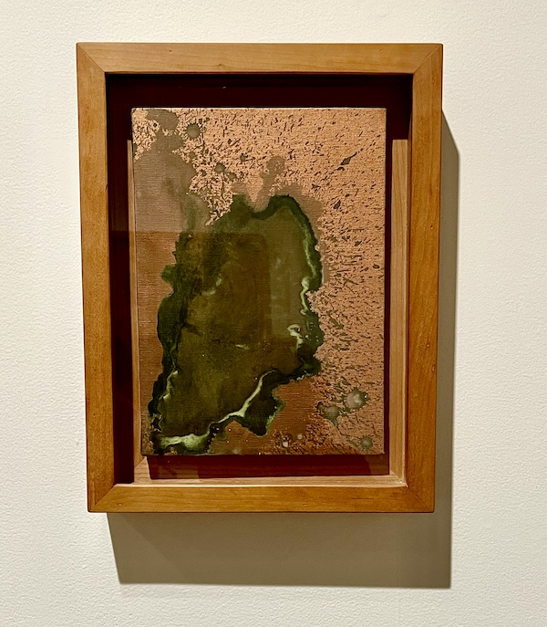 Green and copper abstract painting on display at the Andy Warhol Museum Pittsburgh