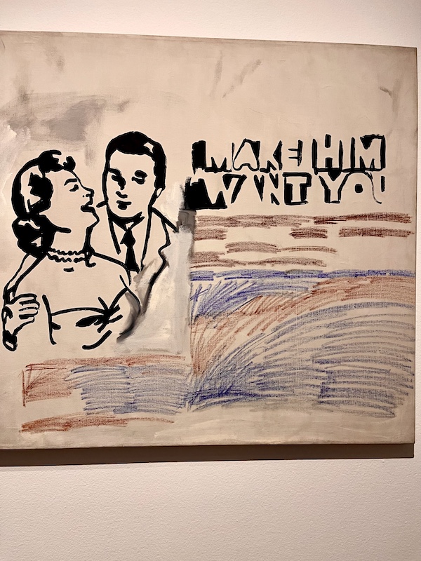 Newspaper-like art of a man and woman, beige, black and colored crayon at the Andy Warhol Museum Pittsburgh