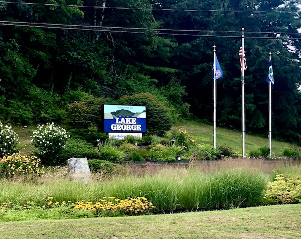 Sign surrounded by landscaping "Lake George New York"
