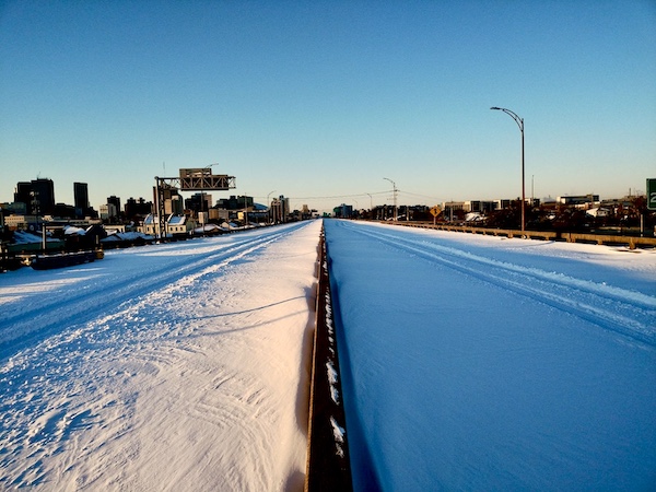 NOLA Should be Renamed SNOWLA! View of interstate that is covered with snow.
