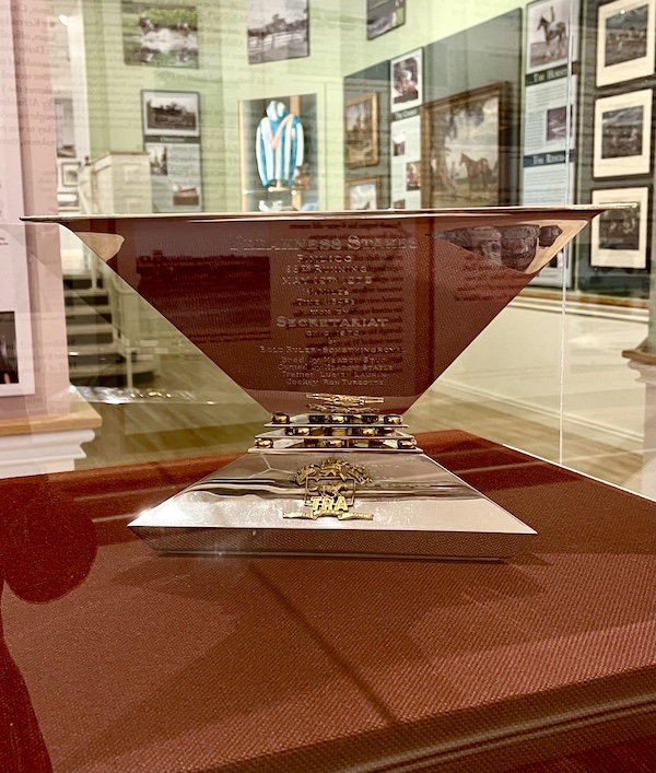 Angular silver and gold trophy on display at the National Museum of Racing and Hall of Fame