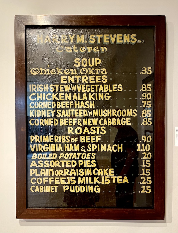 Black menu board with yellow writing, circa 1910 on display at the National Museum of Racing and Hall of Fame