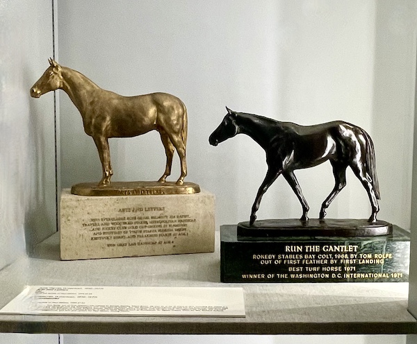 Pair of bronze sculptures representing Belmont Stakes winners at the National Museum of Racing and Hall of Fame