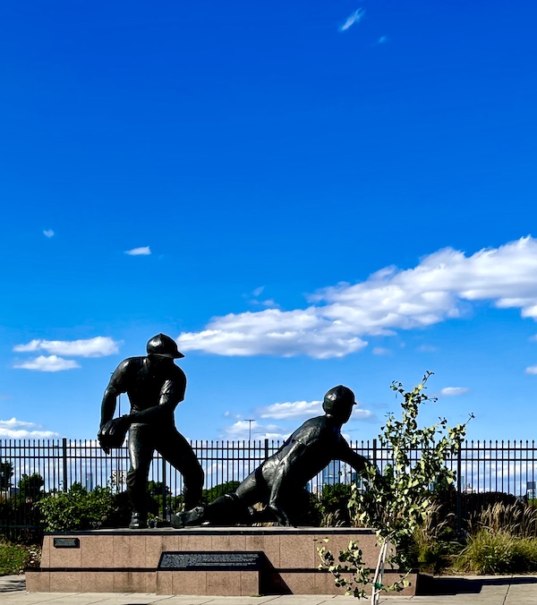 Bronze sculpture of two baseball players seen on our Tour of Downtown Philadelphia