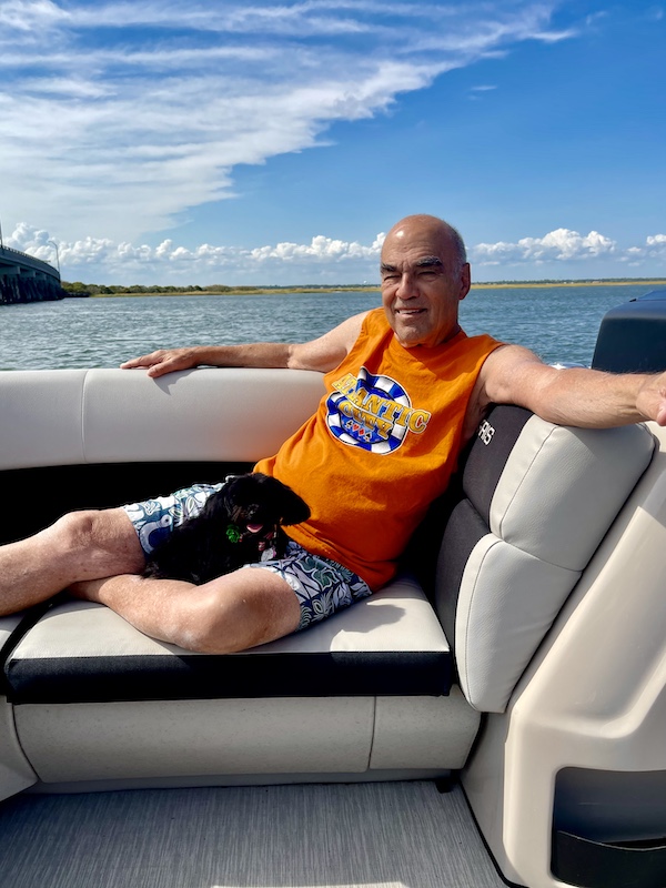 Steve relaxing on a boat with a black puppy on his lap. Another great Autumn Memories at Jersey Shore
