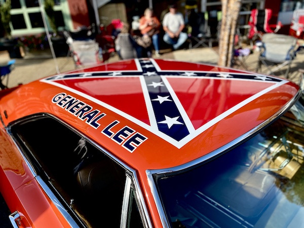 Roof of orange car painted with Confederate flag and General Lee at the Downtown Pickens Car Show