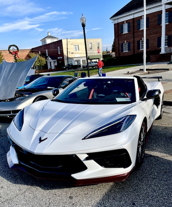 White new Corvette with top off at the Downtown Pickens Car Show
