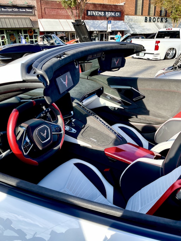 Red, white and black interior of a 2023 Corvette at the Downtown Pickens Car Show