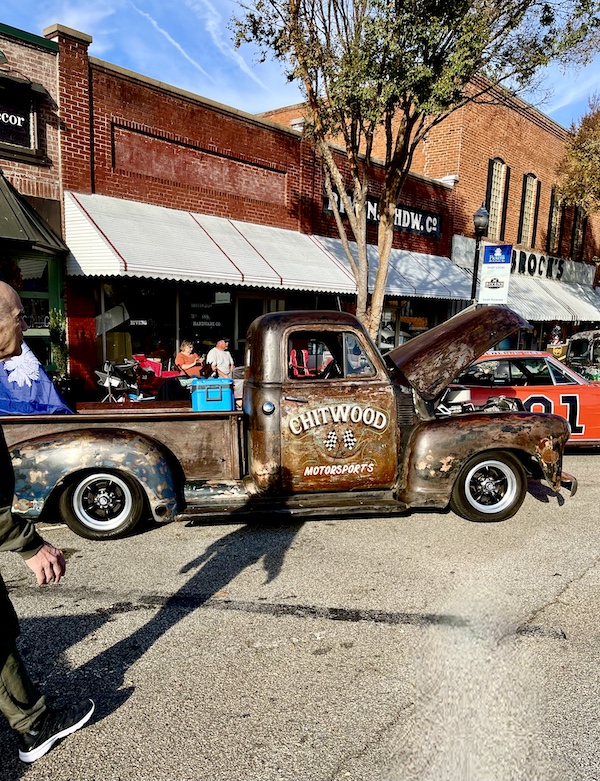 Camo painted old pickup truck at the Downtown Pickens Car Show