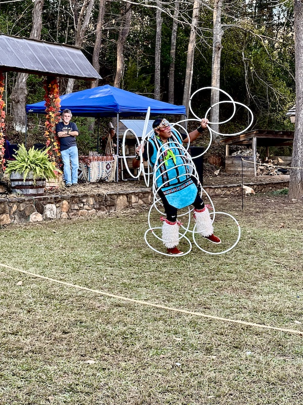 Native American doing a ring dance on the lawn at Hagood Mill Native American Celebration